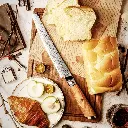 Couteau à Pain – Acier damassé 67 couches avec noyau AUS-10 – Manche élégant en bois d’olivier – Tranchant rasoir, dureté 60±2 HRC – Design ergonomique et haut de gamme